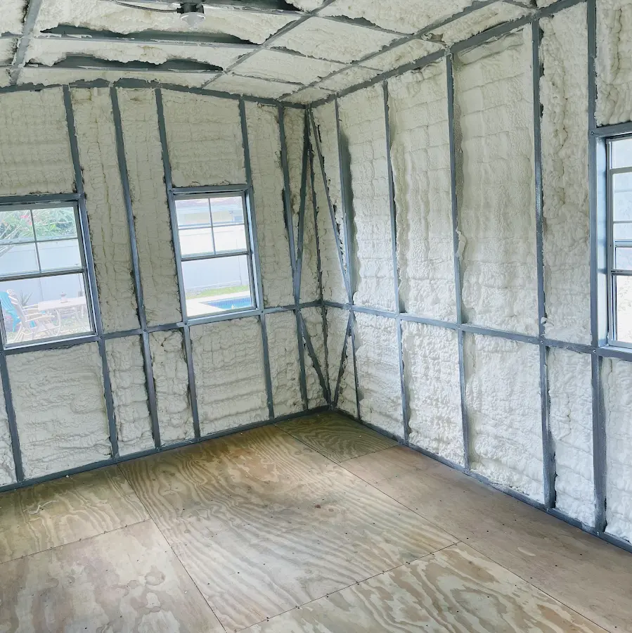 Closed-cell spray foam insulation applied to wall cavities in a residential project in Lower