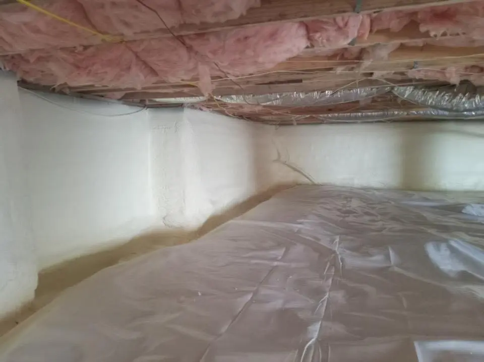Crawl space encapsulation with closed-cell spray foam for Commercial Roof Restoration in Lower